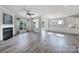 Bright living room with fireplace, large windows, and open floor plan at 2364 Delaney Dr, Fort Mill, SC 29715