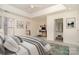Bright bedroom features a desk, walk-in closet, and neutral decor at 243 Lincoln St, Charlotte, NC 28203
