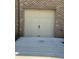 A close-up of a closed garage door, showcasing its design and curb appeal at 243 Lincoln St, Charlotte, NC 28203
