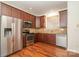 Modern kitchen with stainless steel appliances and wood cabinets at 243 Lincoln St, Charlotte, NC 28203