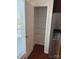 Pantry with wire shelving next to window and stainless fridge at 243 Lincoln St, Charlotte, NC 28203