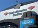 A modern stadium stands with a sign for Bank of America and flags waving above at 243 Lincoln St, Charlotte, NC 28203