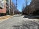 A street view showcasing the exterior of the homes in a community setting at 243 Lincoln St, Charlotte, NC 28203
