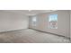 Spacious bedroom featuring plush carpet and large windows at 2605 Goose Fair Rd, Maiden, NC 28650