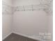Walk-in closet featuring wire shelving and carpeted floor at 2605 Goose Fair Rd, Maiden, NC 28650