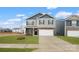 Charming two-story home with a well-maintained lawn and a two-car garage at 2605 Goose Fair Rd, Maiden, NC 28650
