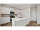 Modern kitchen featuring white cabinetry, quartz countertops, and stainless steel appliances at 2605 Goose Fair Rd, Maiden, NC 28650