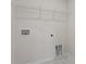 A functional laundry room with tile flooring and essential connections for appliances at 2605 Goose Fair Rd, Maiden, NC 28650