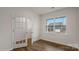 Bright room featuring hardwood flooring, glass paneled door, and abundant natural light at 2605 Goose Fair Rd, Maiden, NC 28650