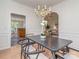 Elegant dining room featuring hardwood floors, wainscoting, and decorative chandelier at 3066 Orion Dr, Fort Mill, SC 29707