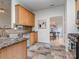 Well-appointed kitchen showcasing granite countertops, tile backsplash, and stainless steel appliances at 3066 Orion Dr, Fort Mill, SC 29707