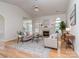 Cozy living room with vaulted ceiling, a fireplace, and plenty of natural light at 3066 Orion Dr, Fort Mill, SC 29707