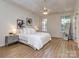 Spacious primary bedroom with hardwood floors, a ceiling fan, and a walk-in closet at 3066 Orion Dr, Fort Mill, SC 29707