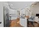 Modern kitchen with white cabinets and stainless steel appliances at 310 E Waterlynn Rd, Mooresville, NC 28115