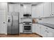 Beautiful kitchen features stainless appliances and ample counter space at 310 E Waterlynn Rd, Mooresville, NC 28115