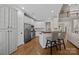 Bright kitchen with stainless appliances and a breakfast bar at 310 E Waterlynn Rd, Mooresville, NC 28115
