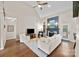 Inviting living room features a fireplace and vaulted ceilings at 310 E Waterlynn Rd, Mooresville, NC 28115