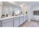 Elegant bathroom featuring a double vanity, large mirror, and ample counter space at 3101 Virginia Trail Ct, Fort Mill, SC 29715