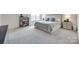 Comfortable bedroom featuring neutral colors, a shelf with shoes, and a side table at 3101 Virginia Trail Ct, Fort Mill, SC 29715