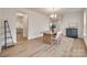 Open dining area with modern decor, hardwood floors, and plenty of natural light at 3101 Virginia Trail Ct, Fort Mill, SC 29715