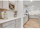 Well-lit kitchen featuring stainless steel appliances, quartz countertops, and ample cabinet space at 3101 Virginia Trail Ct, Fort Mill, SC 29715