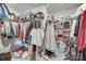 Spacious walk-in closet with ample storage and metal rack for organizing clothing and accessories in a home at 3101 Virginia Trail Ct, Fort Mill, SC 29715