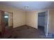 Bedroom featuring carpet, closet, and neutral walls, perfect for new decor at 3103 Blue Ridge Dr, Shelby, NC 28150