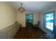 Cozy dining room with natural light, featuring a decorative chandelier and hardwood floors at 3103 Blue Ridge Dr, Shelby, NC 28150