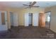 Bright bedroom featuring multiple closets, access to other rooms and a ceiling fan at 3103 Blue Ridge Dr, Shelby, NC 28150