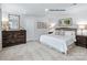 A serene main bedroom featuring a comfortable bed, matching nightstands, and elegant decor at 336 Maplestead St # 1080, Lancaster, SC 29720