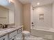 Stylish bathroom with granite countertop vanity and white subway tile shower at 3439 Stags Leap Way, York, SC 29745