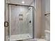 Modern bathroom featuring a sleek glass shower with a marble tile surround at 3439 Stags Leap Way, York, SC 29745