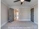 Bedroom with carpet and trim detail with ensuite bathroom and closet at 3439 Stags Leap Way, York, SC 29745