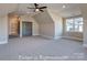 Spacious bonus room with vaulted ceiling, carpeted floor, and ceiling fan at 3439 Stags Leap Way, York, SC 29745