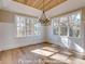 Bright dining room with large windows that provide natural light and views of the outside at 3439 Stags Leap Way, York, SC 29745