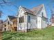 Beautiful white modern farmhouse exterior with green grass and blue sky at 3439 Stags Leap Way, York, SC 29745