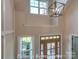Grand foyer with high ceilings, a decorative light fixture, and a view of the front door at 3439 Stags Leap Way, York, SC 29745