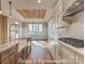 Well-designed kitchen with a breakfast nook, center island, stainless appliances, and lots of natural light at 3439 Stags Leap Way, York, SC 29745