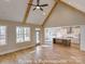 Open concept: Living room flows to the kitchen with island. Hardwood floors throughout at 3439 Stags Leap Way, York, SC 29745