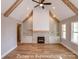 The living room has a fireplace with stone surround and custom built-in cabinets and shelves at 3439 Stags Leap Way, York, SC 29745