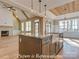 Spacious open floor plan with a fireplace and gourmet kitchen island, ideal for modern living and entertaining at 3439 Stags Leap Way, York, SC 29745