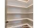 Walk-in pantry with ample shelving for organized storage of food and kitchen essentials at 3439 Stags Leap Way, York, SC 29745