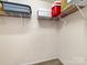 Walk-in closet with multiple storage shelves for optimal organization at 3446 Broadwick St, Charlotte, NC 28213