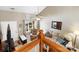 Airy living room boasts high ceilings, large window, and comfortable furnishings at 3446 Broadwick St, Charlotte, NC 28213