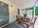 Cozy covered patio with a picnic table, stylish rug and private backyard access at 3446 Broadwick St, Charlotte, NC 28213