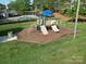 A community playground including several slides and climbing obstacles at 3446 Broadwick St, Charlotte, NC 28213