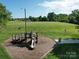 Community playground with slide, swings and play equipment on well maintained lawn at 3446 Broadwick St, Charlotte, NC 28213