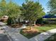 Pool entrance with lush landscaping and a pathway leading to the pool at 3446 Broadwick St, Charlotte, NC 28213