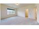Bedroom featuring neutral walls, and a doorway leading into a walk-in closet at 3719 Wave Rock Ct, Fort Mill, SC 29707