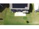 Aerial view of home featuring solar panels, a patio, and a large, well-maintained lawn at 3719 Wave Rock Ct, Fort Mill, SC 29707
